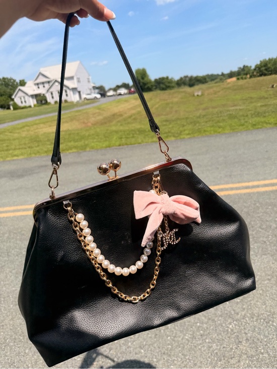 Juicy Couture Handbags - Juicy Couture Black Shoulder Bag with Pink Bow & Pearl Chain